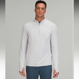 Lululemon Surge Warm Reflective 1/2 Zip in Heathered Sea Salt